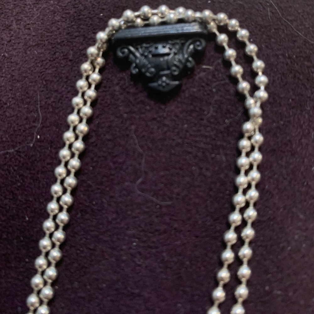 LAGOS please sign pendant.